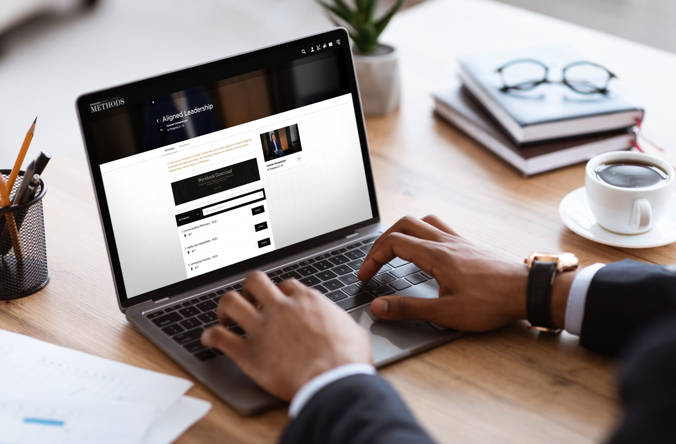 African businessman hands typing on laptop with blank screen